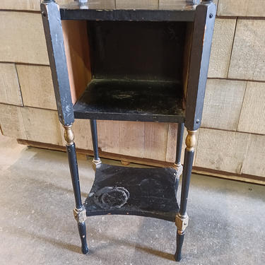 Unique little wood and metal end table