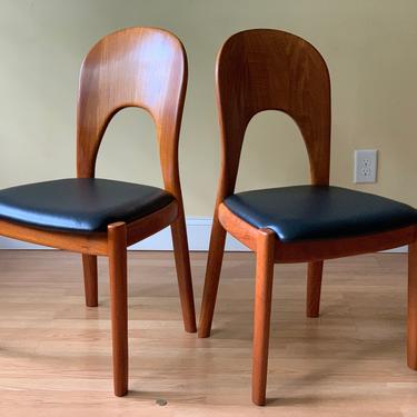 TWO MORTEN solid teak dining chairs in black leather 