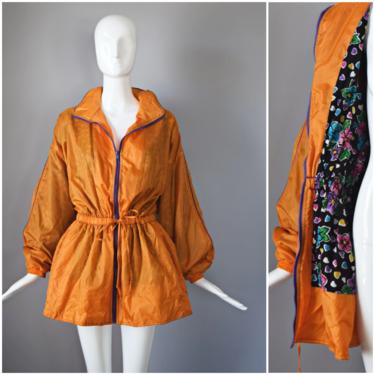 vtg 90s Basic Rituals orange parka windbreaker jacket w/ pockets and colorful floral lining and tie waist 1990s XL Large rainbow coat 