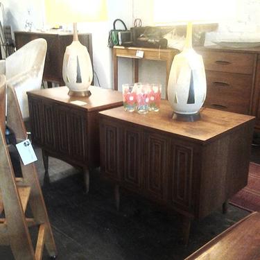 Pair of Broyhill "Sculptra" night/end tables with lots of open storage behind doors.  Just in at Hunted House.