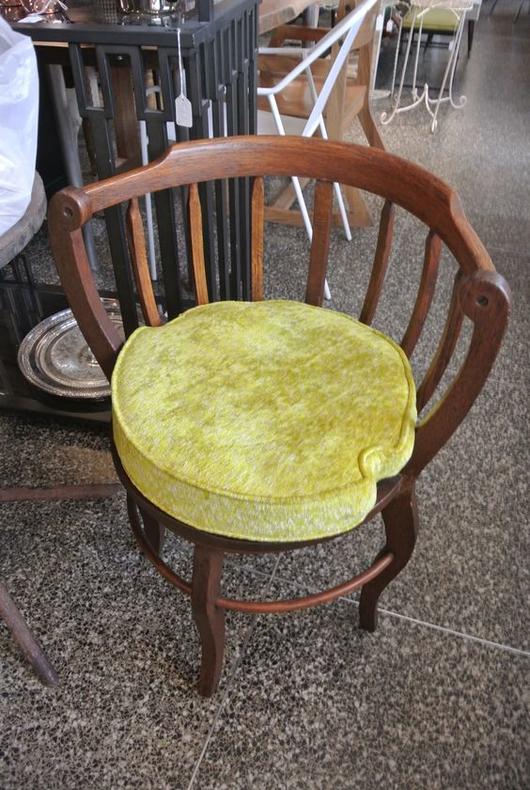 Wood chair with yellow cushion. $70
