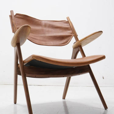 Exposed Walnut Sling Back chair in the fashion of Hans Wegner 