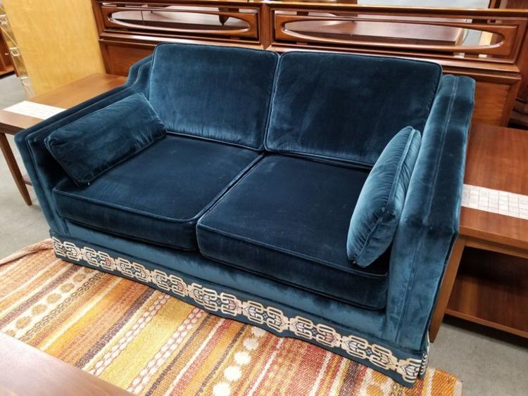                   Vintage teal velvet love seat with reversible cushions