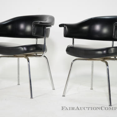 Black and chrome armchairs