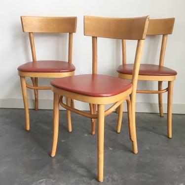 set of 3 vintage mid century modern cafe chairs.