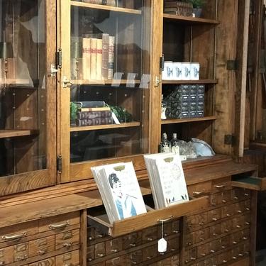 Vintage hardware store wall unit