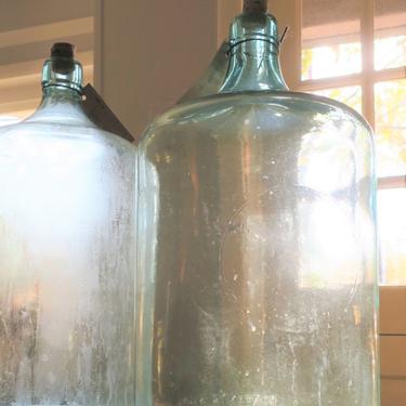 Blue glass water bottles - $65 each