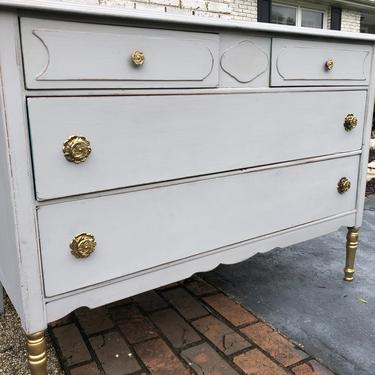 Vintage dresser painted in grey + gold 