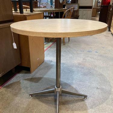 Round laminate top with metal base table. 29.5” x 30”