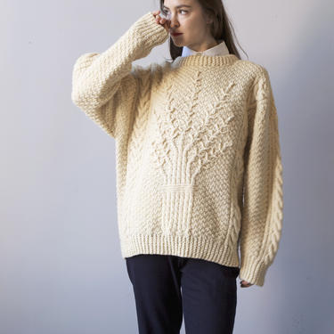 Vintage hand knits chunky ivory crew neck cable sweater with potted plant 