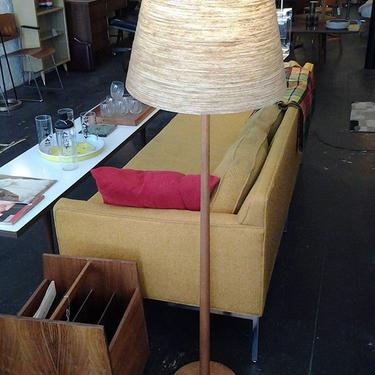 Swedish Modern teak floor lamp with original fiberglass shade on sale this weekend,