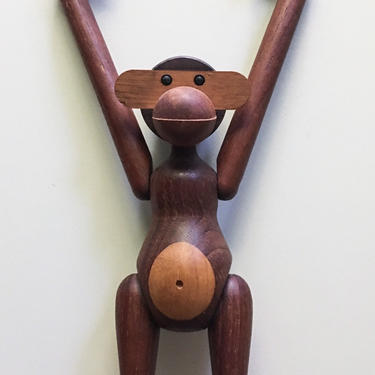 Iconic articulated monkey in teak and limba wood 