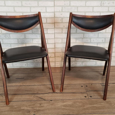 Pair of Stackmore Black Vinyl and Wood Folding Chairs 