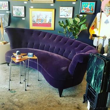                   Purple velvet asymetrical tufted sofa