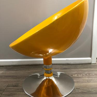 Orange fiberglass swivel pod chair post modern 