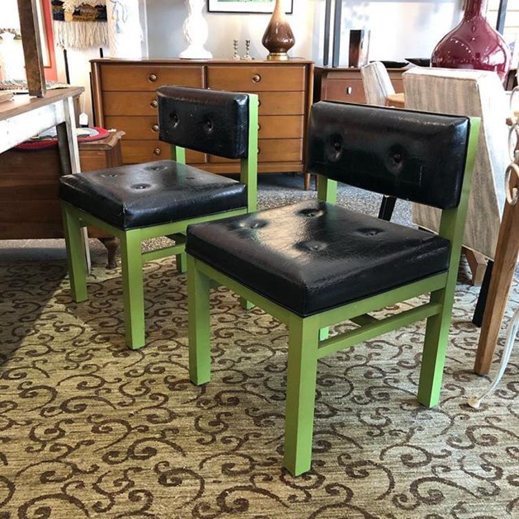                   4 black and green chairs