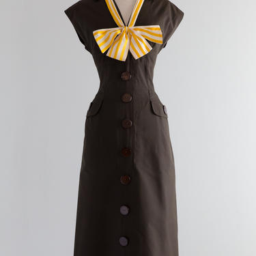 Vintage 1950s Dress - 50s Dorothy Hubbs Fitted Brown Cotton Button Down Wiggle Dress With Big Striped Yellow Bow // Waist 28 by xtabayvintage