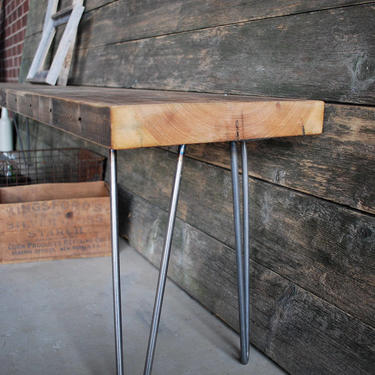 Industrial Console Table with reclaimed wood top and mid century styled hairpin legs.  Custom inquiries welcome. 