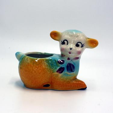 vintage lamb planter in bright yellow and blue 