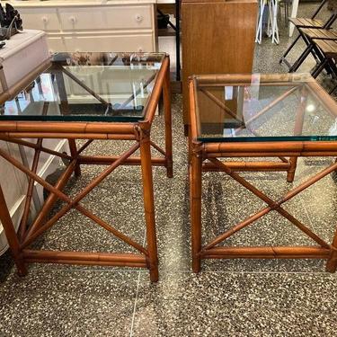 Rattan and glass side tables. Sold separately. Smaller 25” x 21” x 23” Larger 30” x 21” x 26” glass on both is 1/2 thick