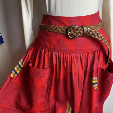 Red linen skirt~ colorful patches of color shapes~ large bucket pockets in front~ fit & flare~ 1990’s trends~ size SM/4/ 27” waist 