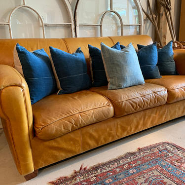 Leather sofa, 7' l x 40" d x 3' t, $895.