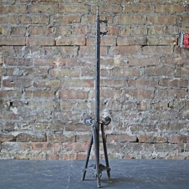 vintage industrial rolling stage light tripod stand by Mole-Richardson, scalable and foldable 