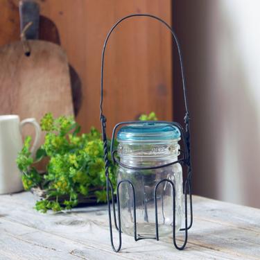 Vintage wire mason canning jar holder with Atlas jar / antique primitive metal canning jar holder / lantern candle holder / rustic farmhouse 