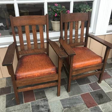 Pair mission oak arm chairs 