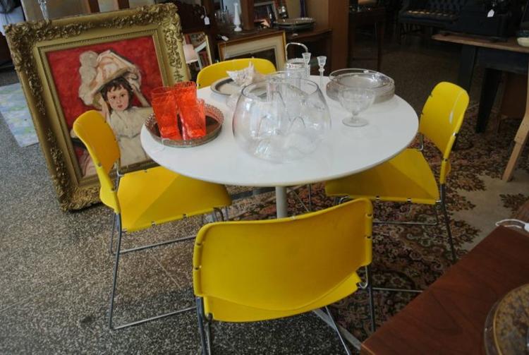Yellow Chairs, $38/each / White Tulip Table, $425