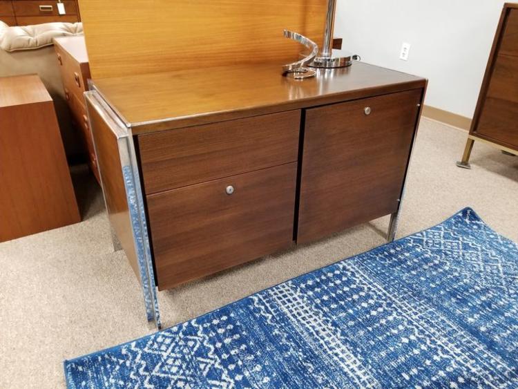                   Mid-Century Modern small credenza with chrome accents