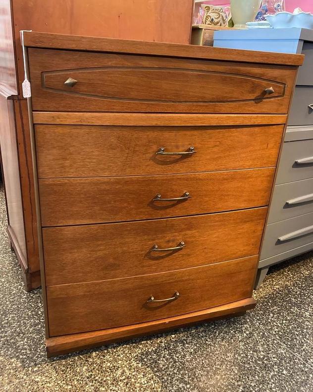 Laminate top, 4 drawer mid century chest of drawers, by Bassett. 34” x 18.5” x 43”