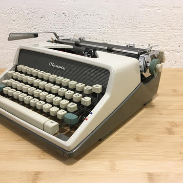 1961 Olympia SM7 Deluxe Portable Typewriter with Case, New 2 Color Ribbon, Senatorial Font 