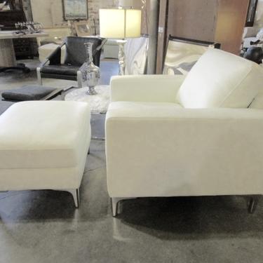 CONTEMPORARY WHITE LEATHER CHAIR AND OTTOMAN