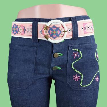 1960s embroidered bell bottoms. Like new vintage hip hugger jeans. Pink, green, blue flowers. Crewel stitching. By Lee. 