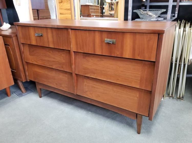                   Mid-Century Modern walnut six drawer dresser with slat fronts