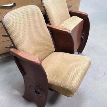 Vintage pair of theater seats with deco styling. Wood frames upholster seat and back in a gold boucle fabric. Just $150 for the pair! We have about 10 sets available