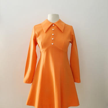 dolly | vintage 1970s orange polyester mini dress 