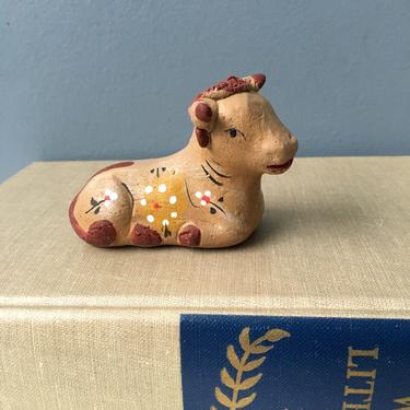 Folk art pottery laying cow - vintage rustic pottery 