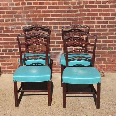 Aqua vinyl covered vintage dining chairs