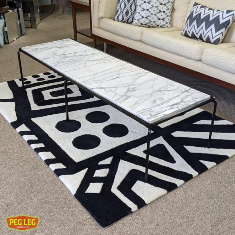 Mid-Century Modern iron coffee table with marble top by Alan Gould