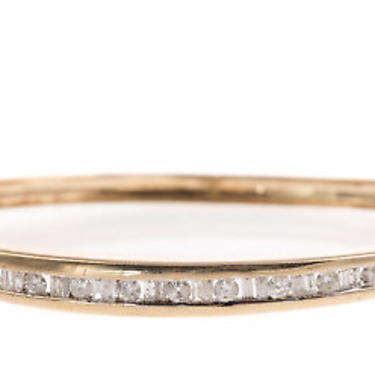 Vintage 10K yellow gold hinged bangle bracelet with baguette cut and full cut diamonds 