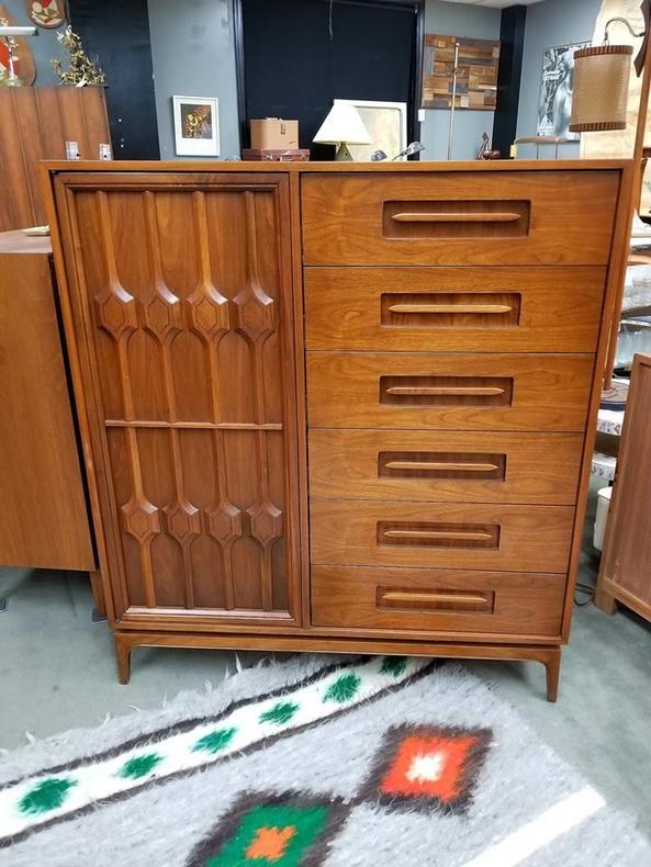 Mid-Century Modern walnut chifferobe with sculpted fronts
