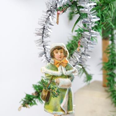 Vintage Feather Tree Embossed Scrap Christmas Ornament , Girl with Tinsel Hanger 
