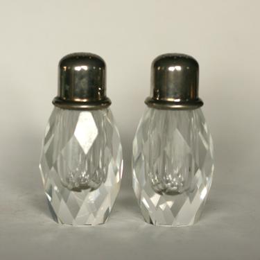 vintage crystal faceted salt and pepper shakers with silver plate tops 