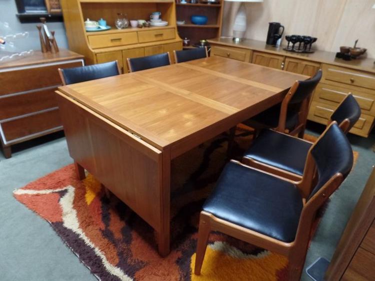 Large Danish Modern teak dining table with drop side leaves