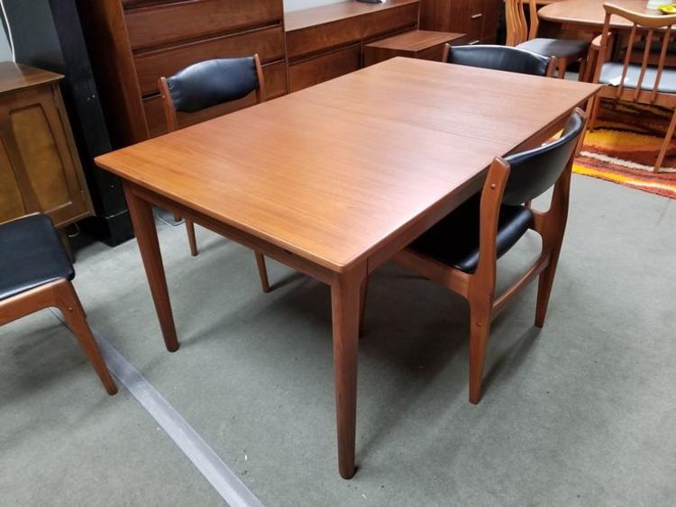 Danish Modern teak dining table with butterfly leaf