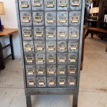 Vintage industrial stripped steel factory storage cabinet with brass handles 