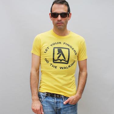 80s vintage Yellow Pages t-shirt, yellow, distressed, outdated, relic, slogan, advertising 