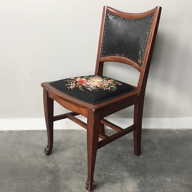 antique needlepoint and leather chair from Hotel Savoy Seattle